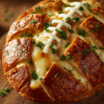 Football Shaped Cheesy Stuffed Garlic Bread with melted mozzarella and garlic butter