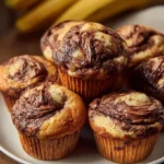nutella banana swirl muffins that are moist and ba 2026 02 24 130022 819x1024 1