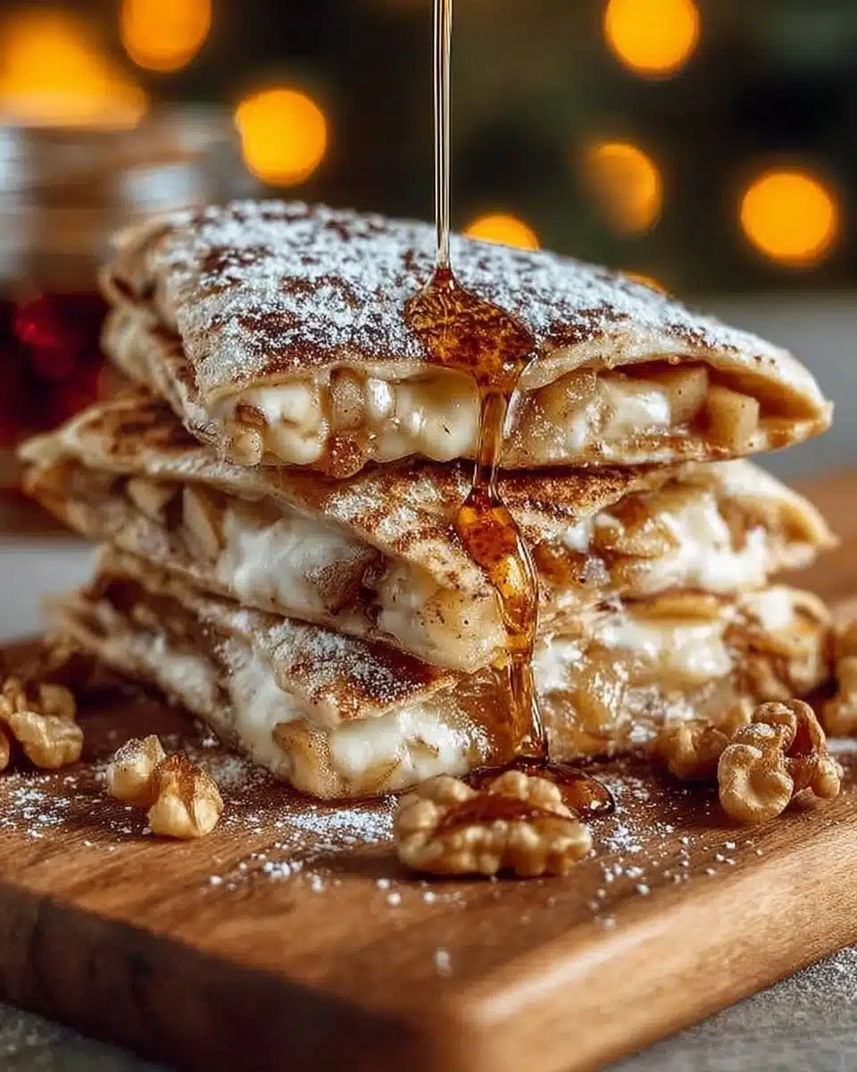 Apple cinnamon breakfast quesadillas with warm spiced apples on a plate